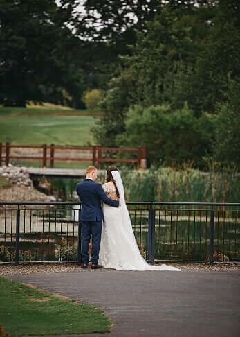 Newly Wed Couple By Lake